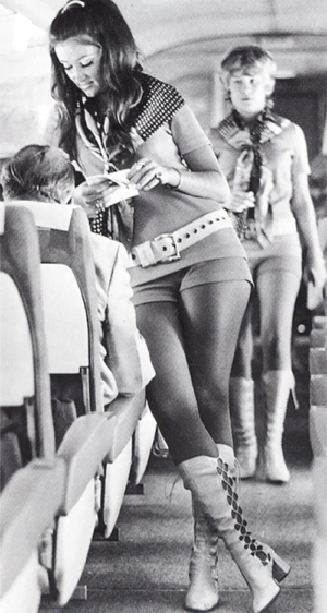 Photo of two more beautiful Southwest Airlines stewardesses with long lean legs.